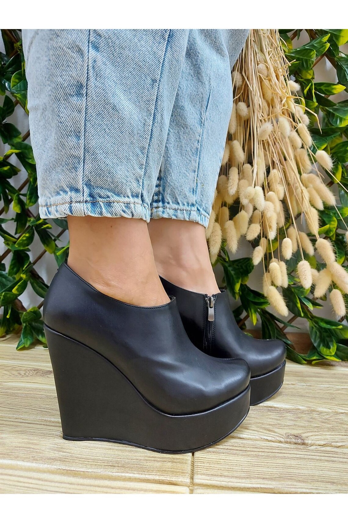 black wedge heel bootie