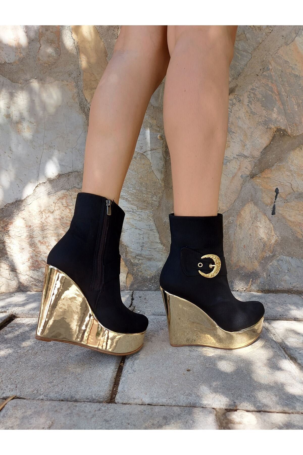 gold and black wedge heels