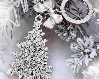 Portachiavi a forma di albero di Natale in argento, ideale per le feste.