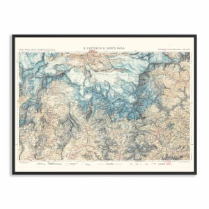 May include: A framed vintage topographical map titled II. CERVINO E II. MONTE ROSA by Touring Club Italiano. The map features detailed terrain in shades of beige, brown, and blue, depicting mountain ranges, glaciers, and valleys with text labels.