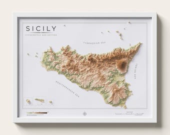May include: A framed topographic map of Sicily titled SICILY HYPSOMETRIC GEO EDITION. The map features detailed relief shading in shades of tan, brown, and green, labelling the Tyrrhenian Sea, Ionian Sea, and Mediterranean Sea with a scale bar.