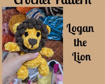 May include: A handmade yellow and brown crochet lion, with the text "Crochet Pattern" and "Logan the Lion". The lion has a fluffy mane and is held in a hand. Yarn in various colors is in the background.