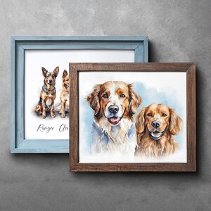 Puede incluir: Dos pinturas de acuarela enmarcadas de perros. La primera pintura presenta un perro marr&oacute;n y negro sentado con un perro blanco sentado detr&aacute;s de &eacute;l. La segunda pintura presenta dos perros golden retriever. La primera pintura est&aacute; en un marco azul claro y la segunda pintura est&aacute; en un marco marr&oacute;n oscuro. La primera pintura est&aacute; titulada "Ranger Cleo".