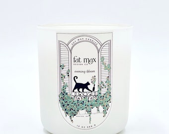 May include: White soy wax candle with a black cat illustration and the text "fat max design co. evening bloom" on the label. The candle is 13 oz.