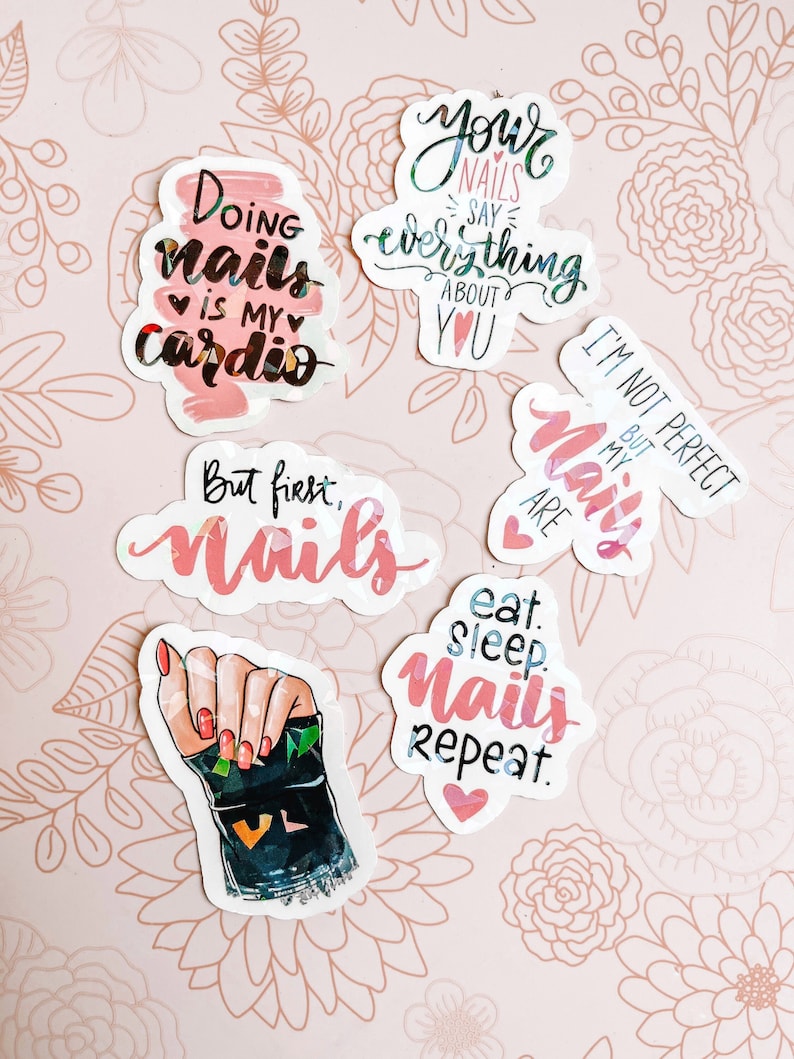 May include: Five colorful stickers with nail-themed sayings. The stickers feature pink, white, and black text on a white background. The text on the stickers reads: "Doing nails is my cardio", "Your nails say everything about you", "I'm not perfect but my nails are", "But first, nails", and "Eat, sleep, nails, repeat."