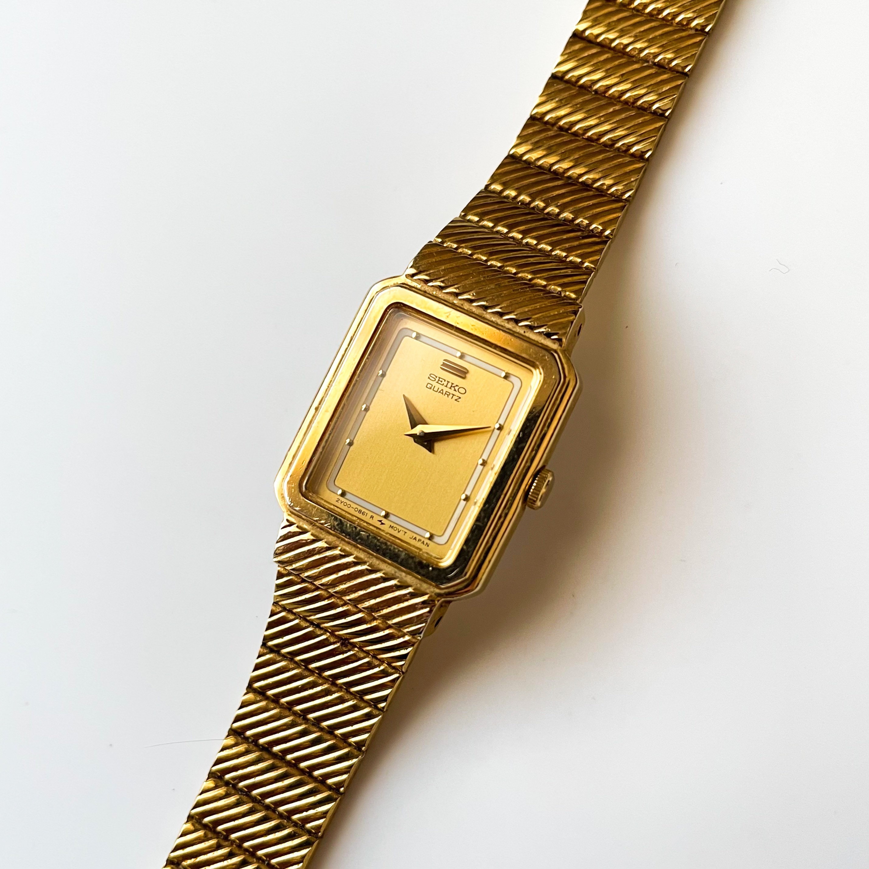 Seiko quartz top gold watch square