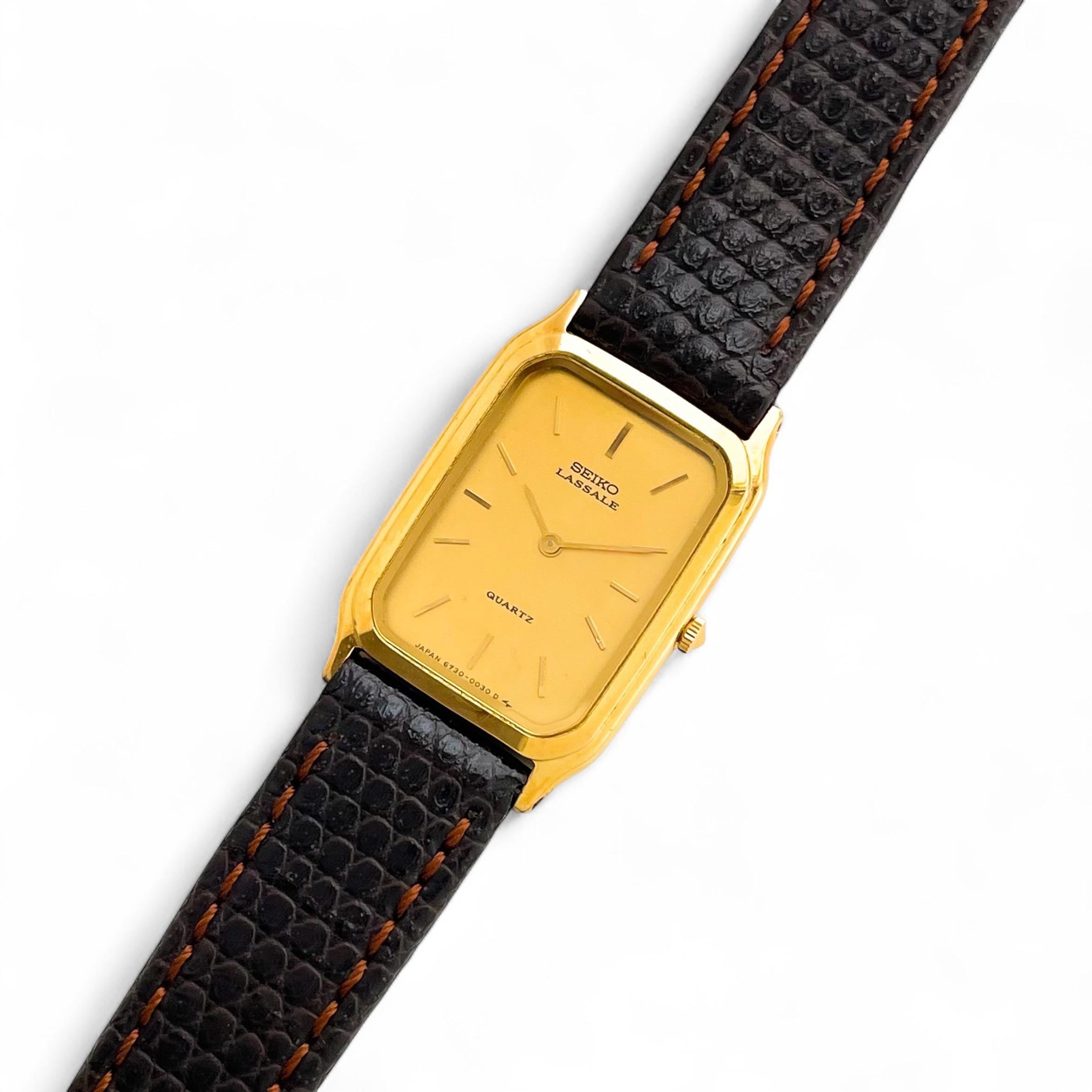 SEIKO クォーツ 時計 1986年製 ゴールド/ブラック Yahoo!オークション -「1986」(さ行) (ブランド腕時計)の落札