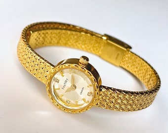 Elegant 24k Gold-Plated Ladies' Quartz Watch with Small Round Dial and Faceted Glass