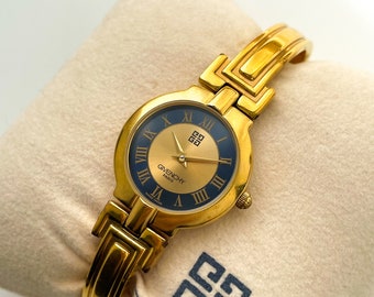 Vintage 1990s Gold-Plated Ladies' Givenchy Bangle Quartz Watch with Blue and Gold Dial