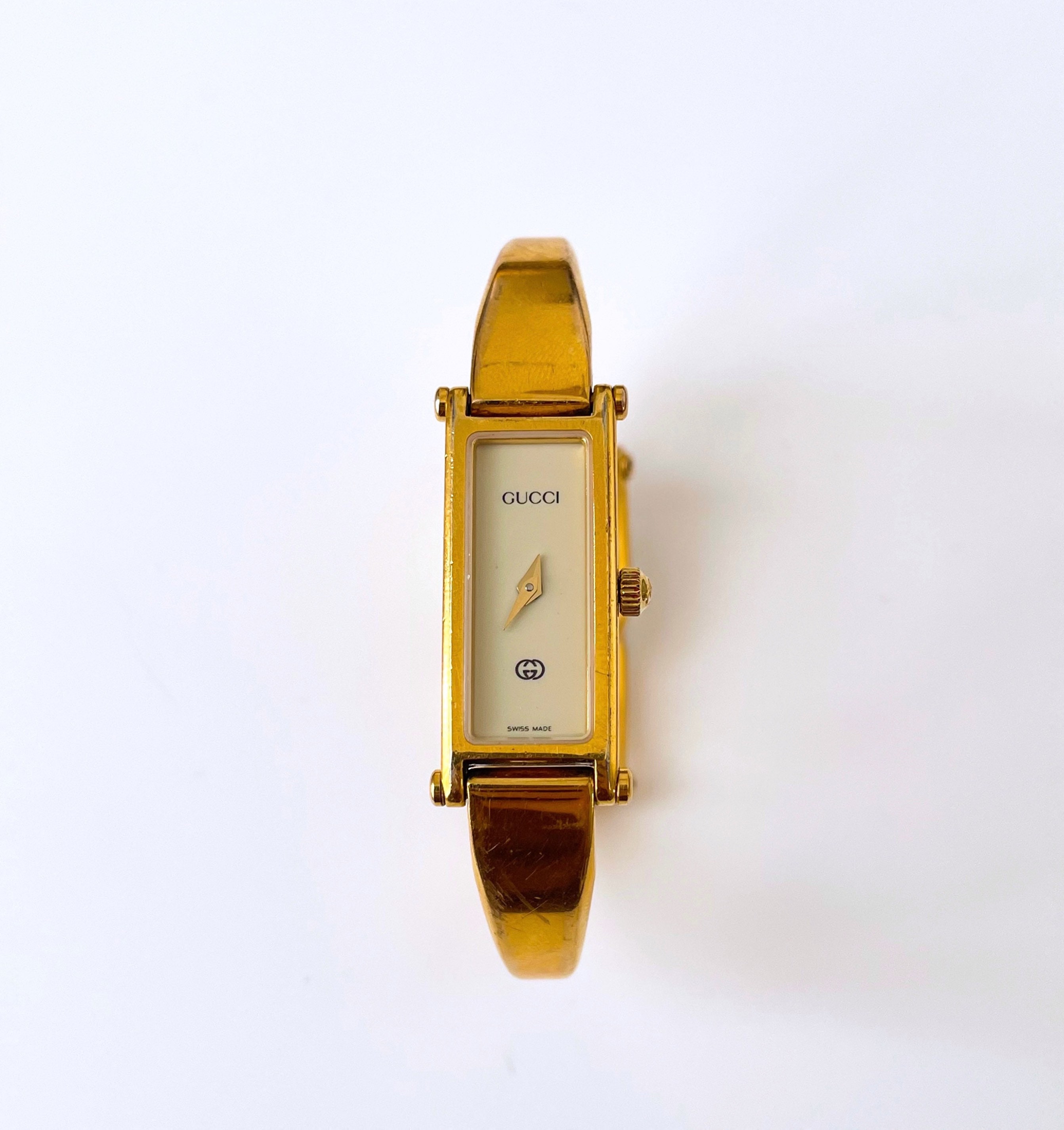Montre Gucci Bangle Gold Tone avec cadran rectangulaire Cream Tone