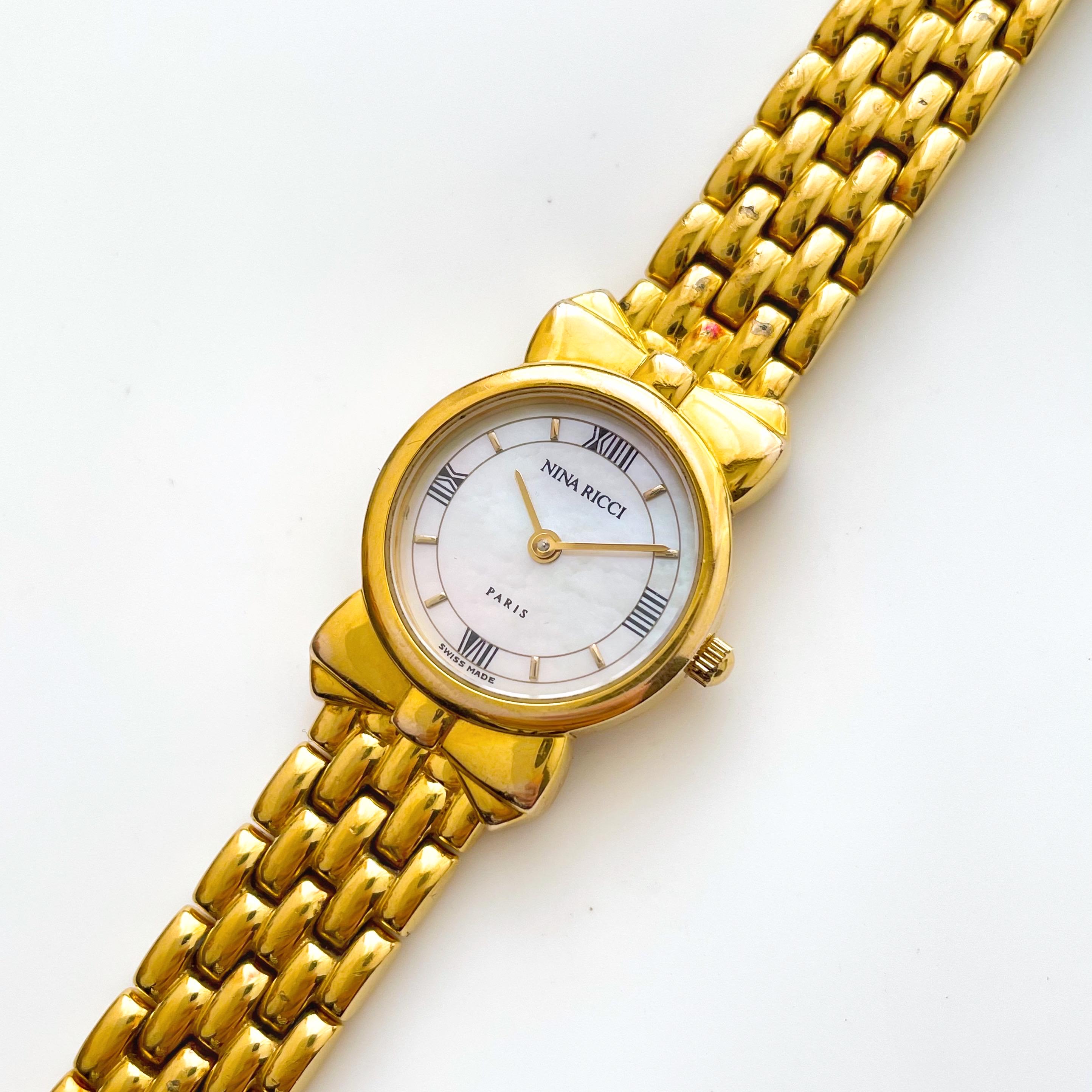 Vintage 1990s Gold plated Ladies Nina Ricci Quartz Watch With Round Mother of Pearl Dial Etsy UK