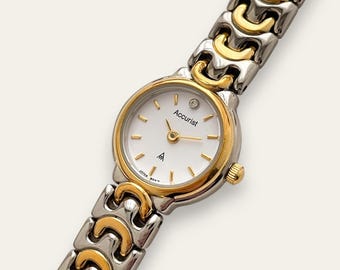 Vintage Accurist tweekleurig quartzhorloge met witte wijzerplaat en damesarmband.
