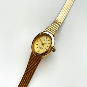 Vintage Ladies' Zeon Watch with Gold Tone Bracelet and Oval Dial