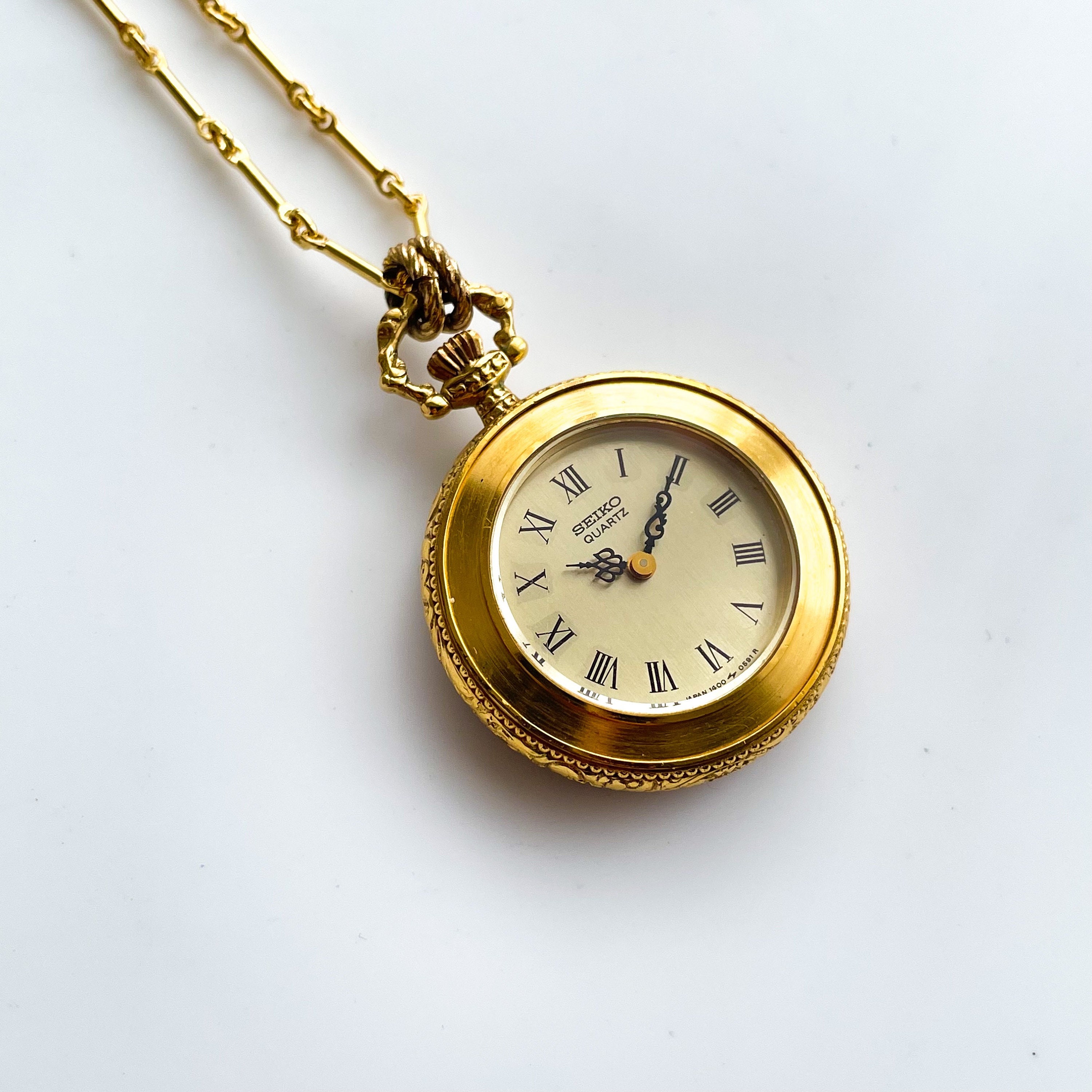 [Used]T035 SEIKO SEIKO pendant necklace watch gold rolling by hand - BE  FORWARD Store