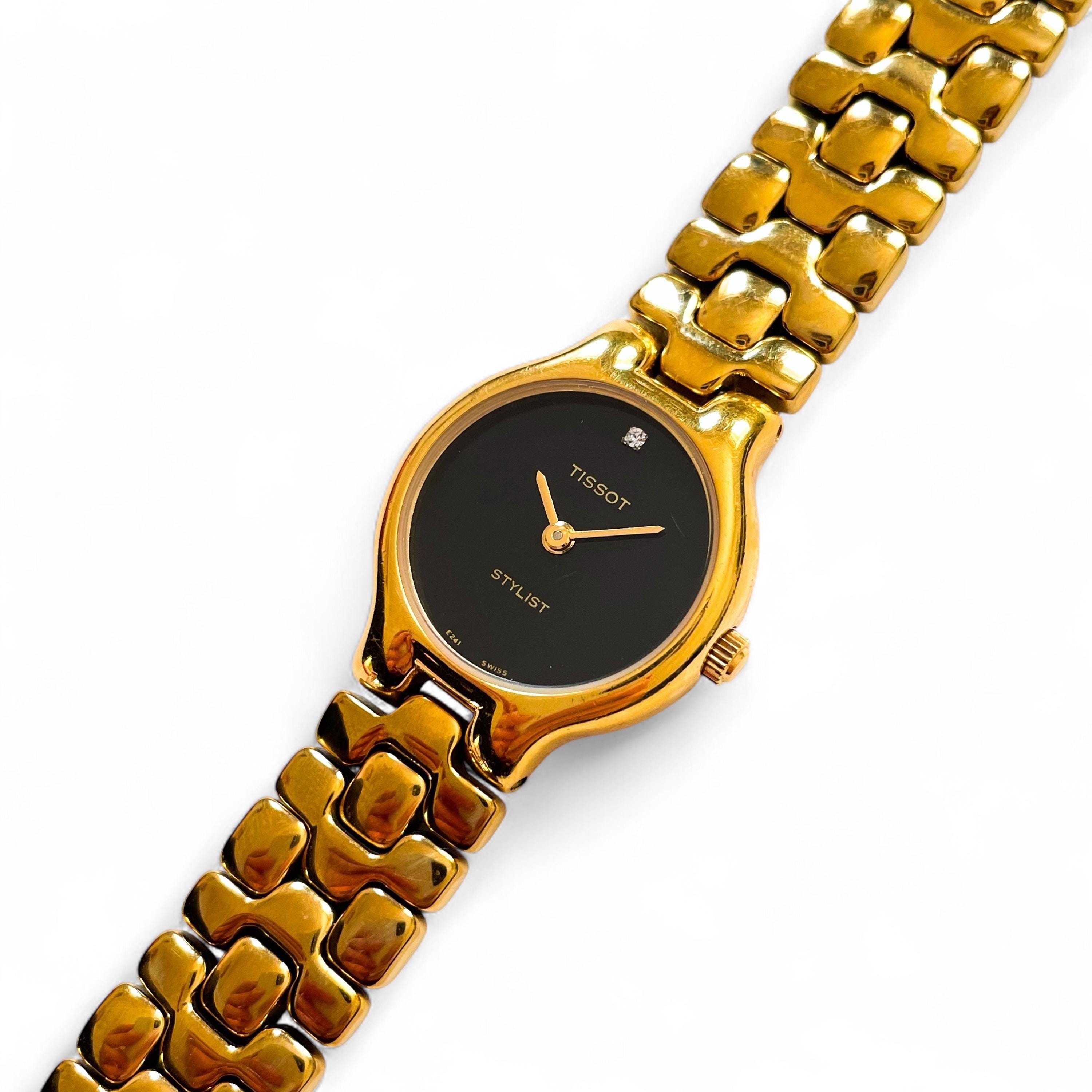 Tissot gold watch