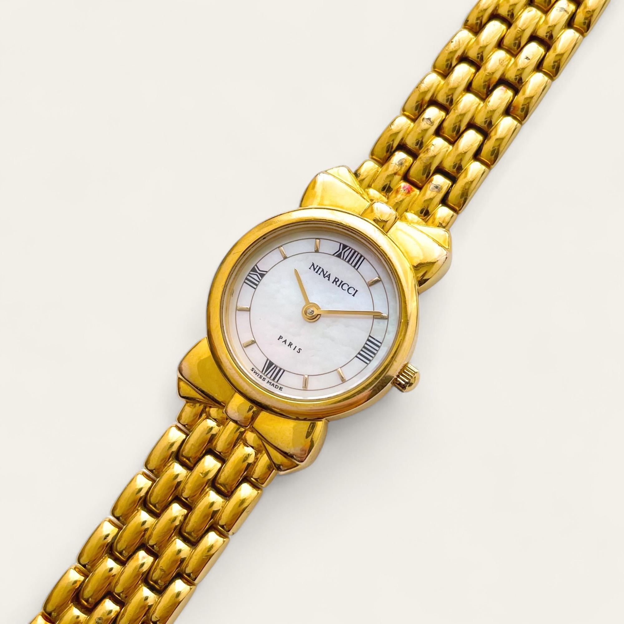 Vintage Nina Ricci Gold-plated Watch: Mother of Pearl Dial, Ribbon