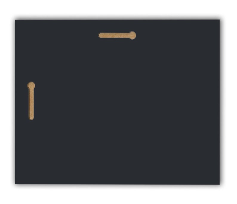 May include: A black rectangular sign with two small, rectangular, brown hanging slots at the top and one on the left side.