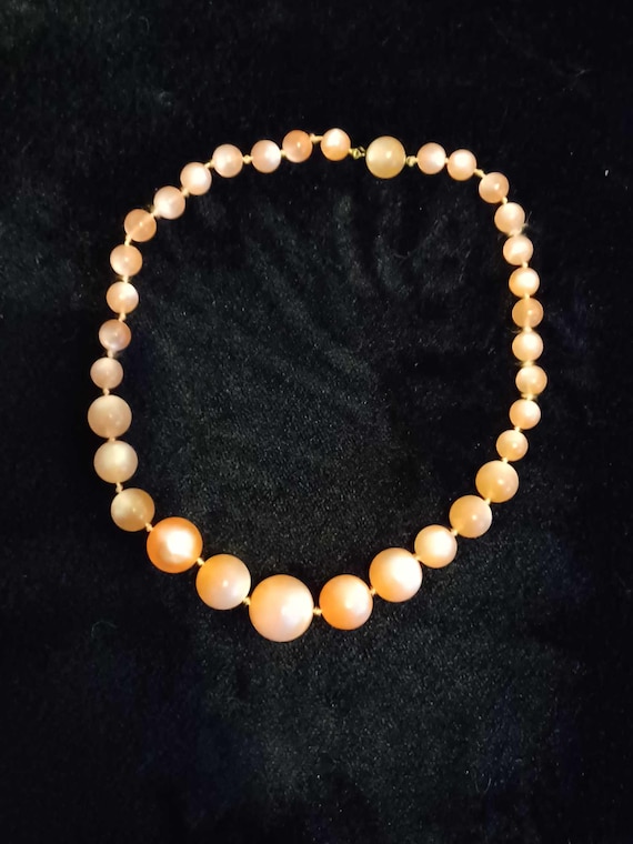 Vintage, peach luster Lucite MoonGlow necklace