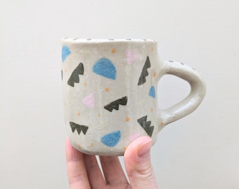 Cup, stoneware mug with colorful hand-painted patterns, contemporary ceramic inspired by Memphis Design, unique handmade pottery piece
