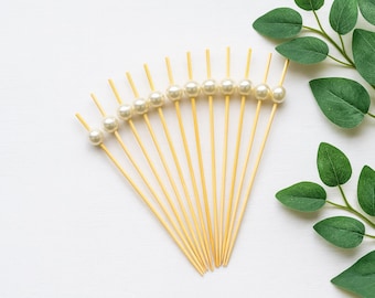 Brochetas de bambú con perlas, ideales para decorar tartas, cócteles y manualidades.