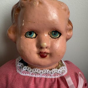 Very old antique Compositiom doll with soft body Blinking eyes