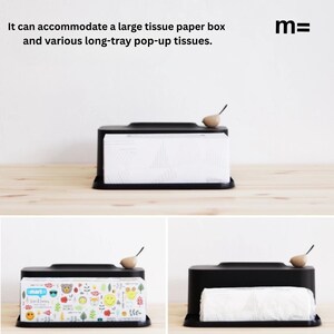 May include: Black tissue box holder with a small wooden bird on top. The holder is designed to accommodate a large tissue box or a long-tray pop-up tissue box. The text "mart" is visible on the tissue box.