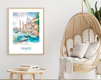 May include: A watercolor painting of Venice, Italy, with a view of the Grand Canal and the Basilica di San Marco. The painting is framed in a light wood frame and is hanging on a white wall.
