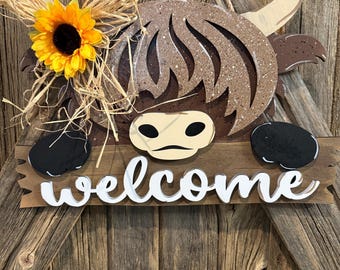 Bienvenido Fence Cow