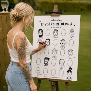 May include: A white sign on an easel with the text "celebrating 21 YEARS OF OLIVER June 2026". The sign has drawn faces and blank spaces for drawing. A person is drawing on the sign with a black marker.