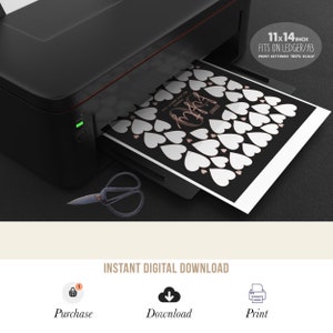 May include: A printable 11x14 inch heart guest book with the text "Our Love Story" in a rose gold font. The printable is designed to fit on ledger or A3 paper and the print settings should be set to 100% scale.