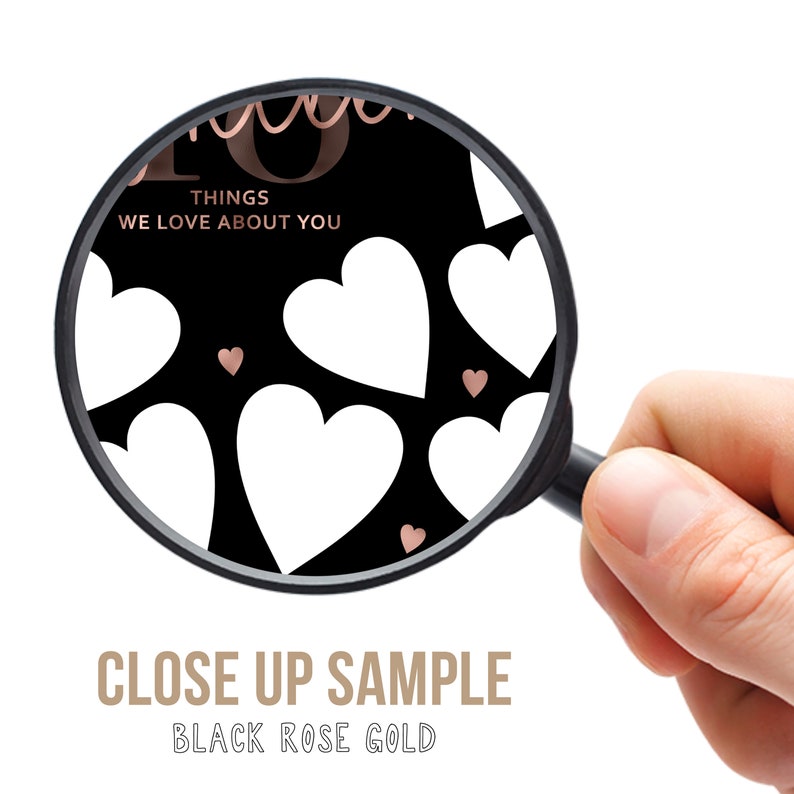 May include: Close-up of a black and rose gold printable with a pattern of white hearts and the text "10 Things We Love About You".