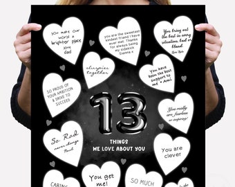 May include: Black and white print with the text "13 THINGS WE LOVE ABOUT YOU." The print features 13 heart-shaped designs with various phrases, including "You make our world a brighter place" and "So much fun."