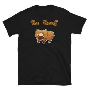 May include: Black t-shirt with the text "Be Doof" in brown letters and a cartoon image of a brown furry creature with a toothy grin.