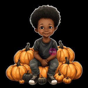 May include: A young boy with an afro hairstyle sits on a pile of orange pumpkins. He is wearing a gray t-shirt and blue jeans. The pumpkins are various sizes and shapes.