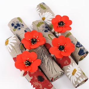 Guardanapo de linho com flor de papoula: decoração de mesa floral