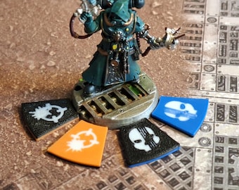 Engage and Conceal. Two tone tokens. Kill Team Compatible Engage and Conceal tokens.  Fourteen of each type for Hoard Teams. Orange and Blue
