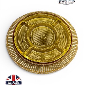 May include: A gold-coloured, round serving tray with a textured surface and multiple compartments. The tray has a sparkling, beaded border. The image includes the text "AG jewel hub" and a "UK Seller" badge.