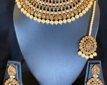 Indian Pakistani bridal necklace set choker gold colour Bollywood style. Party wear. With earrings tikka