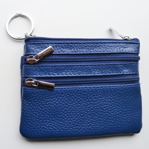 Cuero genuino 2 bolsillos laterales Bolso azul, verde o púrpura con llavero