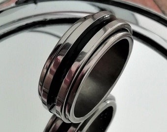 Spinner ring zwart centrum op zilver, meditatie ring, draaiende ring, roterende ring, fidget ring, zorgen ring, statement ring, spin ring