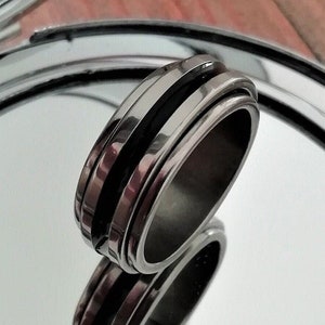Rings that spin in the best sale center