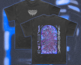 May include: Black t-shirt featuring a graphic print of a blue and purple design with a white outline. The design depicts a tree-like structure within a circular frame, with the text "OMNIRA" visible.