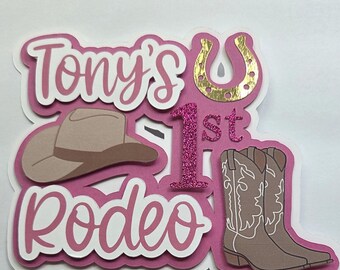 Rodeo birthday cake topper.  Cowboy hat and cowboy boots.