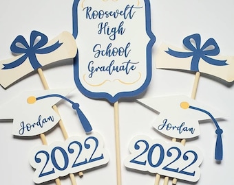 Graduation party centerpieces or display table decor. Graduation open house decor. Class of 2026. Custom school color and graduate name
