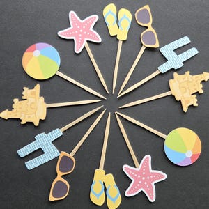 beach theme Birthday cupcake toppers with custom number,  sandcastle, beach ball, sunglasses