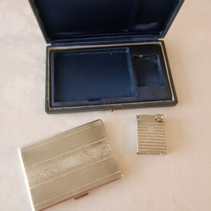 Seltenes Sammlerstück aus Silber für Tabak und Feuerzeug. Originalkarton