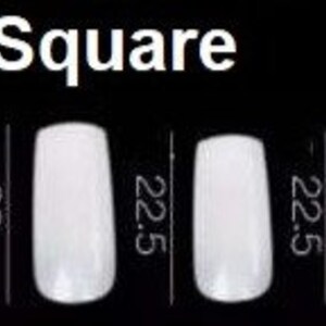 May include: A set of ten white square-shaped false nails in sizes 25.5, 24.5, 24, 23, 22.5, 22.5, 21.5, 21, 20, and 19.5 inches.