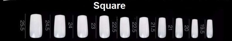 May include: A set of ten white square-shaped false nails in sizes 25.5, 24.5, 24, 23, 22.5, 22.5, 21.5, 21, 20, and 19.5 inches.