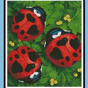 May include: A cross stitch pattern titled Lady Love Bugs by Artecy Cross Stitch, featuring three red ladybugs with black heart-shaped spots on green leaves with yellow flowers. Includes technical details for 14, 16, and 18 count fabric sizes.