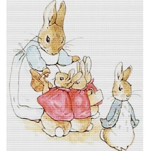 May include: A cross-stitch pattern featuring Peter Rabbit and his family. The design includes the text "PETER RABBIT" and "X SQUARED CROSS STITCH". The design size is 19.21 x 22.00 inches.